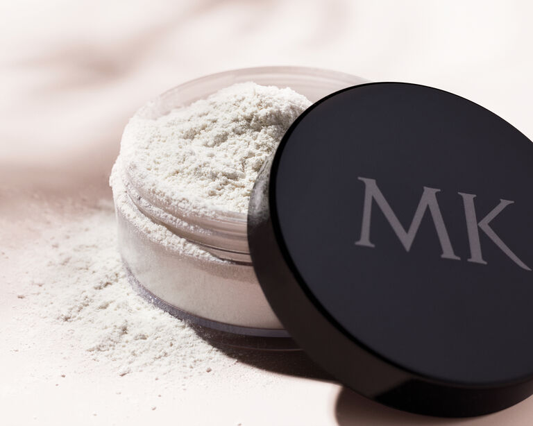 Container of Translucent Loose Powder with open lid